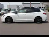 2024 Toyota Corolla Touring W×B (Hybrid) with vehicle inspection and maintenance included. Black Van for sale, Japanese used car export - photo 19 of 20 | GULJI TRADERS