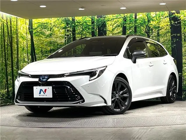 2024 Toyota Corolla Touring Hybrid Double By Pearl Van for sale, Japanese used car export - photo 1 of 30 | GULJI TRADERS