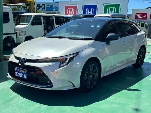 2024 Toyota Corolla Touring Hybrid WxB genuine 10.5-inch display audio with navigation function - photo 1 2024 Toyota Corolla Touring Hybrid WxB genuine 10.5-inch display audio with navigation function Pearl Van for sale, Japanese used car export - photo 1 of 28 | GULJI TRADERS