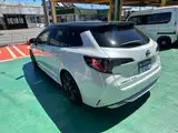 2024 Toyota Corolla Touring Hybrid WxB genuine 10.5-inch display audio with navigation function Pearl Van for sale, Japanese used car export - photo 2 of 28 | GULJI TRADERS