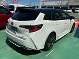 2024 Toyota Corolla Touring Hybrid WxB genuine 10.5-inch display audio with navigation function Pearl Van for sale, Japanese used car export - photo 11 of 28 | GULJI TRADERS
