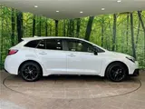 2024 Toyota Corolla Touring Active sports Pearl Van for sale, Japanese used car export - photo 21 of 30 | GULJI TRADERS