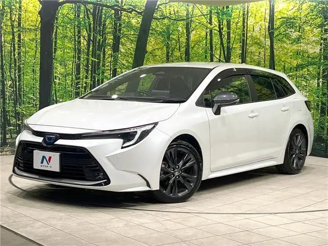 2024 Toyota Corolla Touring Hybrid Double By - photo 1 2024 Toyota Corolla Touring Hybrid Double By Pearl Van for sale, Japanese used car export - photo 1 of 30 | GULJI TRADERS