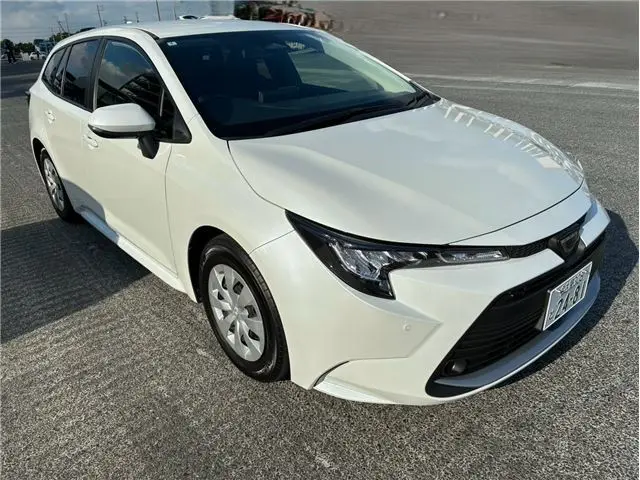 2024 Toyota Corolla Touring G - photo 1 2024 Toyota Corolla Touring G Pearl Van for sale, Japanese used car export - photo 1 of 25 | GULJI TRADERS