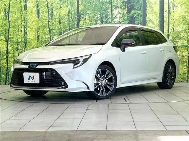 2024 Toyota Corolla Touring Hybrid Double By - photo 1 2024 Toyota Corolla Touring Hybrid Double By Pearl Van for sale, Japanese used car export - photo 1 of 30 | GULJI TRADERS
