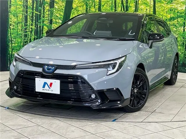 2024 Toyota Corolla Touring Active sports - photo 1 2024 Toyota Corolla Touring Active sports Gray Van for sale, Japanese used car export - photo 1 of 30 | GULJI TRADERS