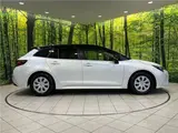 2024 Toyota Corolla Touring Hybrid G Pearl Van for sale, Japanese used car export - photo 17 of 30 | GULJI TRADERS