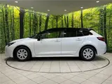 2024 Toyota Corolla Touring Hybrid G Pearl Van for sale, Japanese used car export - photo 21 of 30 | GULJI TRADERS