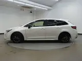 2024 Toyota Corolla Touring 1.8 Hybrid WxB E-Four 4WD Pearl Van for sale, Japanese used car export - photo 2 of 32 | GULJI TRADERS