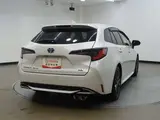2024 Toyota Corolla Touring 1.8 Hybrid WxB E-Four 4WD Pearl Van for sale, Japanese used car export - photo 3 of 32 | GULJI TRADERS