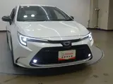 2024 Toyota Corolla Touring 1.8 Hybrid WxB E-Four 4WD Pearl Van for sale, Japanese used car export - photo 25 of 32 | GULJI TRADERS