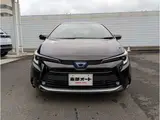 2024 Toyota Corolla Touring 1.8 Hybrid WxB E-Four 4WD Black Van for sale, Japanese used car export - photo 2 of 37 | GULJI TRADERS
