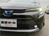 2024 Toyota Corolla Touring 1.8 Hybrid WxB E-Four 4WD Black Van for sale, Japanese used car export - photo 4 of 37 | GULJI TRADERS