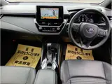 2024 Toyota Corolla Touring 1.8 Hybrid WxB E-Four 4WD Black Van for sale, Japanese used car export - photo 21 of 37 | GULJI TRADERS