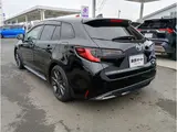 2024 Toyota Corolla Touring 1.8 Hybrid WxB E-Four 4WD Black Van for sale, Japanese used car export - photo 32 of 37 | GULJI TRADERS