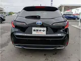 2024 Toyota Corolla Touring 1.8 Hybrid WxB E-Four 4WD Black Van for sale, Japanese used car export - photo 33 of 37 | GULJI TRADERS