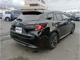 2024 Toyota Corolla Touring 1.8 Hybrid WxB E-Four 4WD Black Van for sale, Japanese used car export - photo 34 of 37 | GULJI TRADERS