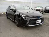 2024 Toyota Corolla Touring 1.8 Hybrid WxB E-Four 4WD Black Van for sale, Japanese used car export - photo 36 of 37 | GULJI TRADERS
