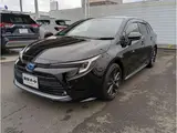 2024 Toyota Corolla Touring 1.8 Hybrid WxB E-Four 4WD Black Van for sale, Japanese used car export - photo 37 of 37 | GULJI TRADERS