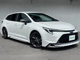 2024 Toyota Corolla Touring Hybrid 4WD Van for sale, Japanese used car export - photo 1 of 24 | GULJI TRADERS