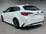 2024 Toyota Corolla Touring Hybrid 4WD Van for sale, Japanese used car export - photo 2 of 24 | GULJI TRADERS