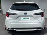 2024 Toyota Corolla Touring Hybrid 4WD Van for sale, Japanese used car export - photo 23 of 24 | GULJI TRADERS