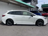 2024 Toyota Corolla Touring Hybrid 4WD Van for sale, Japanese used car export - photo 24 of 24 | GULJI TRADERS