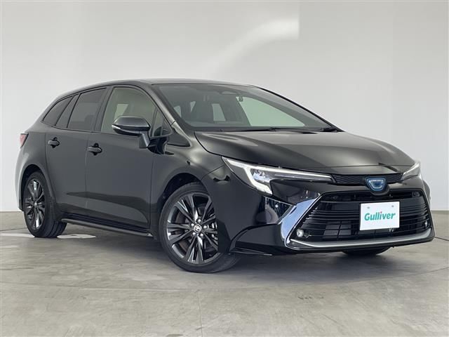 2024 Toyota Corolla Touring Hybrid Van for sale, Japanese used car export - photo 1 of 24 | GULJI TRADERS
