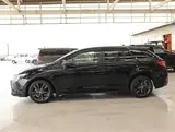 2024 Toyota Corolla Touring 1.5 WxB Black Van for sale, Japanese used car export - photo 29 of 30 | GULJI TRADERS
