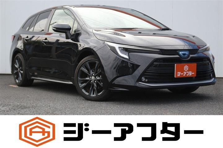 2024 Toyota Corolla Touring 1.8 HYBRID WxB - photo 1 2024 Toyota Corolla Touring 1.8 HYBRID WxB Van for sale, Japanese used car export - photo 1 of 30 | GULJI TRADERS