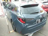 2024 Toyota Corolla Touring W×B (Hybrid Vehicle) 4WD Gray Van for sale, Japanese used car export - photo 2 of 3 | GULJI TRADERS