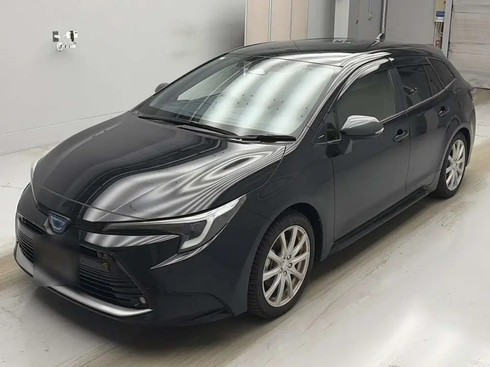 2024 Toyota Corolla Touring Hybrid Double By Black Van for sale, Japanese used car export - photo 1 of 2 | GULJI TRADERS