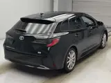 2024 Toyota Corolla Touring Hybrid Double By Black Van for sale, Japanese used car export - photo 2 of 2 | GULJI TRADERS