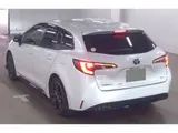 2024 Toyota Corolla Touring Active sports Pearl Van for sale, Japanese used car export - photo 2 of 10 | GULJI TRADERS