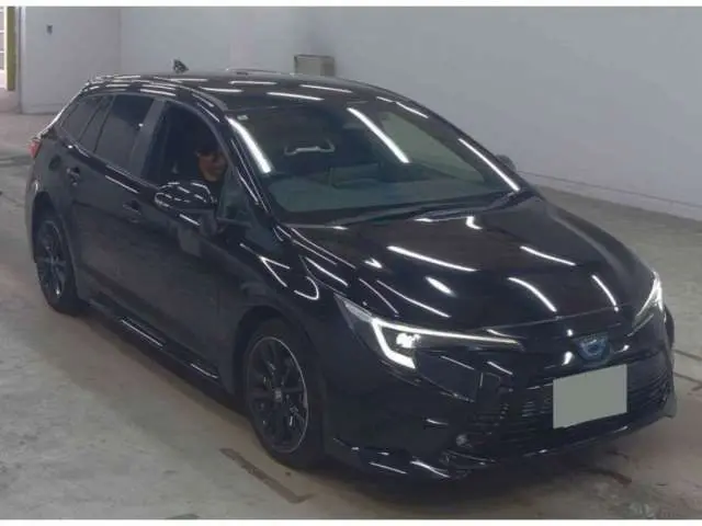 2024 Toyota Corolla Touring Active sports - photo 1 2024 Toyota Corolla Touring Active sports Black Van for sale, Japanese used car export - photo 1 of 14 | GULJI TRADERS