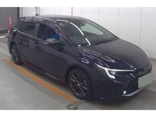 2024 Toyota Corolla Touring Double Bye - photo 1 2024 Toyota Corolla Touring Double Bye Black Van for sale, Japanese used car export - photo 1 of 14 | GULJI TRADERS