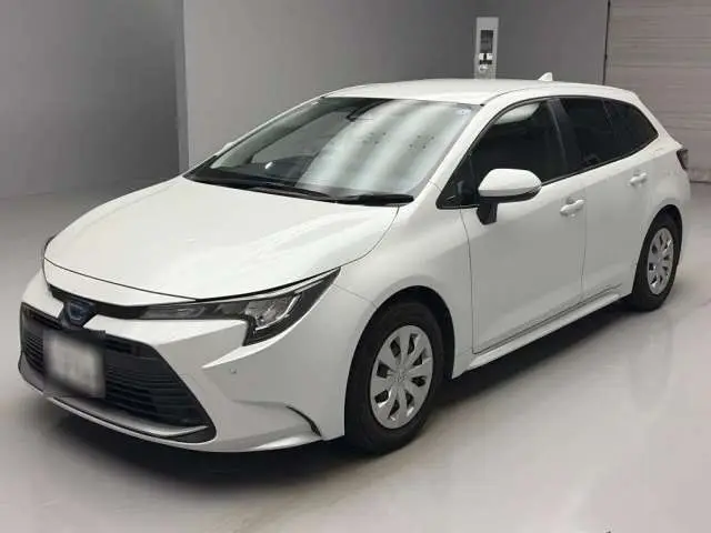2024 Toyota Corolla Touring Hybrid G Pearl Van for sale, Japanese used car export - photo 1 of 12 | GULJI TRADERS