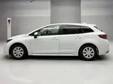 2024 Toyota Corolla Touring Hybrid G Pearl Van for sale, Japanese used car export - photo 5 of 12 | GULJI TRADERS