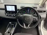 2024 Toyota Corolla Touring Hybrid G Pearl Van for sale, Japanese used car export - photo 8 of 12 | GULJI TRADERS
