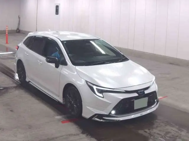 2024 Toyota Corolla Touring Hybrid Double By - photo 1 2024 Toyota Corolla Touring Hybrid Double By Pearl Van for sale, Japanese used car export - photo 1 of 15 | GULJI TRADERS