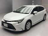 2024 Toyota Corolla Touring Hybrid G Van for sale, Japanese used car export - photo 1 of 12 | GULJI TRADERS