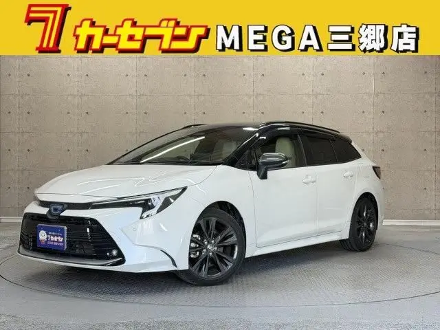 2024 Toyota Corolla Touring 1.8 Hybrid WxB - photo 1 2024 Toyota Corolla Touring 1.8 Hybrid WxB Pearl Van for sale, Japanese used car export - photo 1 of 20 | GULJI TRADERS