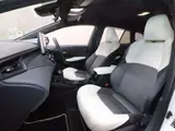 2024 Toyota Corolla Touring 1.8 Hybrid WxB Pearl Van for sale, Japanese used car export - photo 8 of 20 | GULJI TRADERS