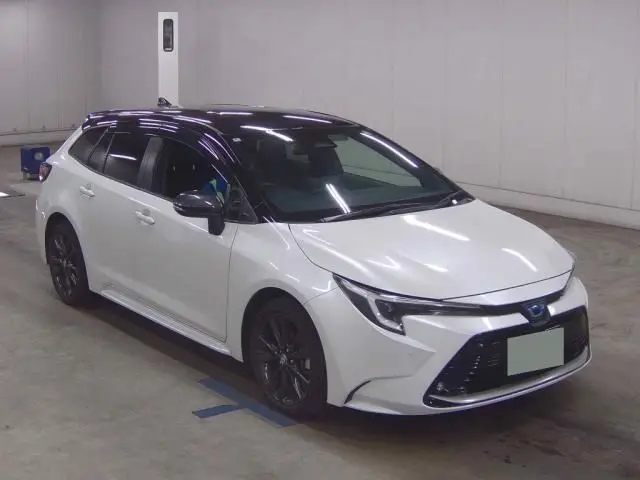 2024 Toyota Corolla Touring Hybrid Double By - photo 1 2024 Toyota Corolla Touring Hybrid Double By Pearl Van for sale, Japanese used car export - photo 1 of 6 | GULJI TRADERS