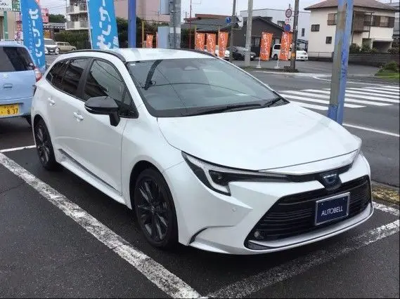 2024 Toyota Corolla Touring W x B - photo 1 2024 Toyota Corolla Touring W x B Other Van for sale, Japanese used car export - photo 1 of 9 | GULJI TRADERS