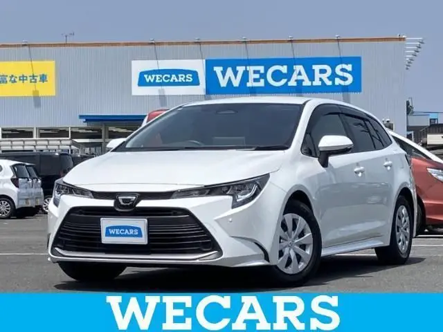 2024 Toyota Corolla Touring G - photo 1 2024 Toyota Corolla Touring G White Van for sale, Japanese used car export - photo 1 of 9 | GULJI TRADERS