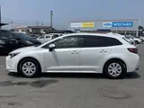 2024 Toyota Corolla Touring G White Van for sale, Japanese used car export - photo 2 of 9 | GULJI TRADERS