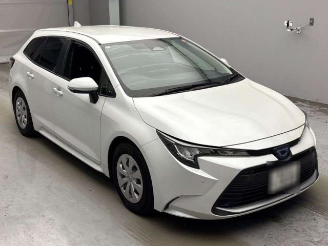2024 Toyota Corolla Touring Hybrid G - photo 1 2024 Toyota Corolla Touring Hybrid G Van for sale, Japanese used car export - photo 1 of 9 | GULJI TRADERS