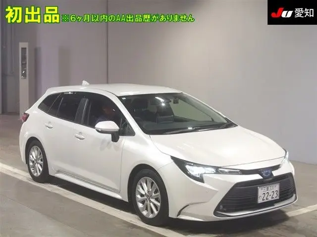 2024 Toyota Corolla Touring Hybrid G - photo 1 2024 Toyota Corolla Touring Hybrid G Pearl Van for sale, Japanese used car export - photo 1 of 9 | GULJI TRADERS