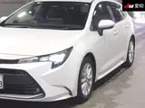 2024 Toyota Corolla Touring Hybrid G Pearl Van for sale, Japanese used car export - photo 7 of 9 | GULJI TRADERS